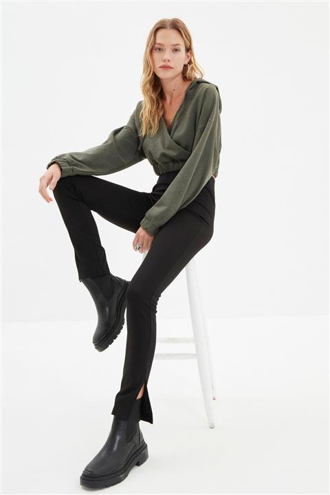 TRENDYOLMİLLA Siyah Ribana Detaylı Yırtmaçlı Örme Pantolon TWOAW22PL0633